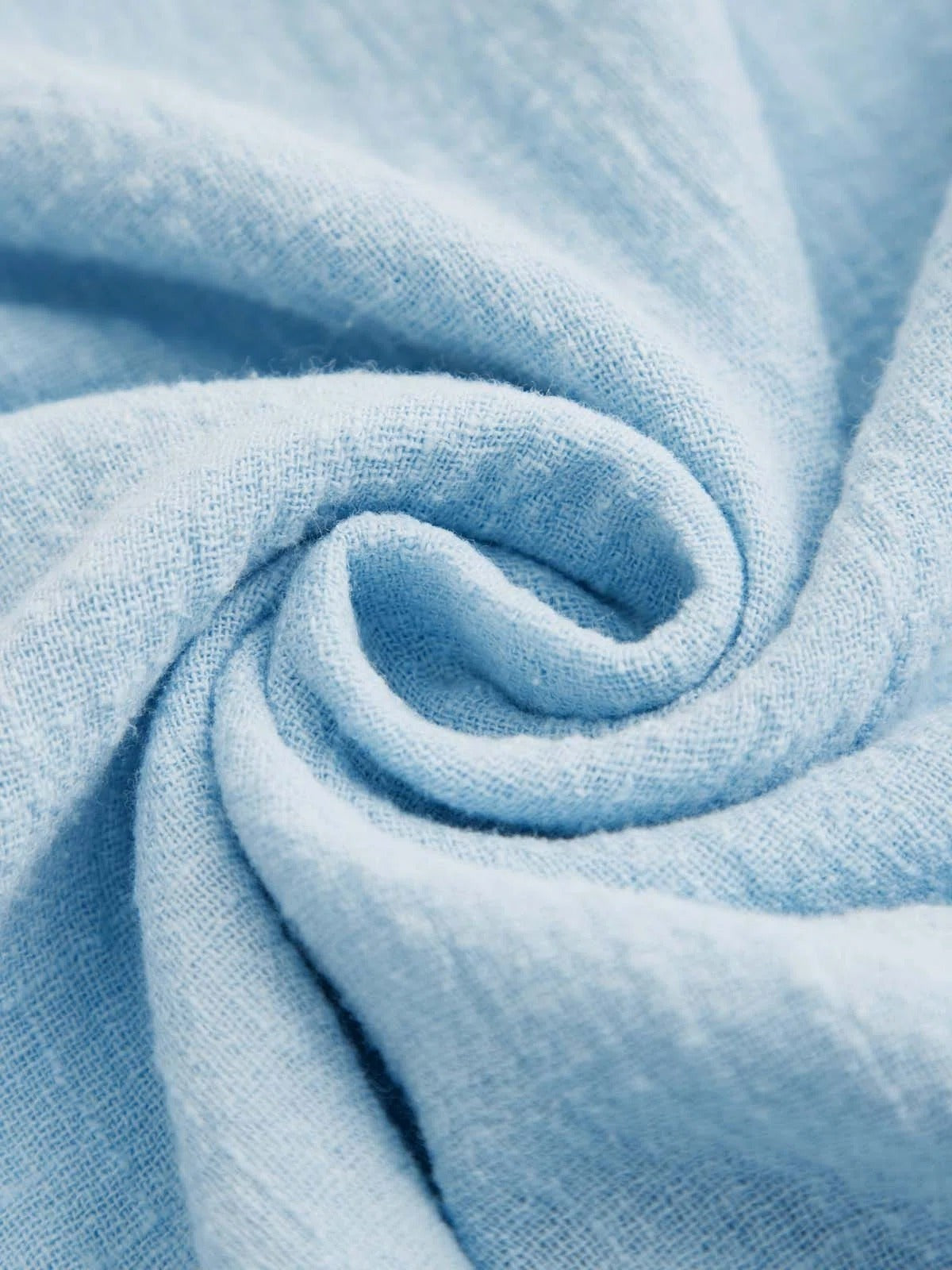 Blue button-trim asymmetrical hem blouse for women | Ondine