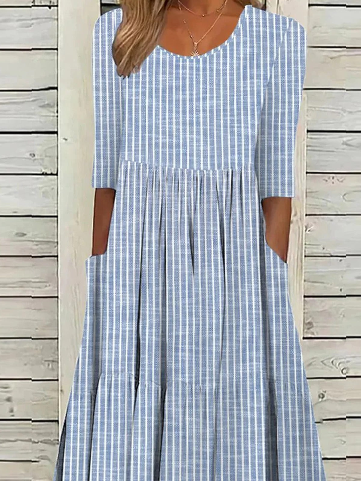 Striped loose fit midi dress for women | Colette