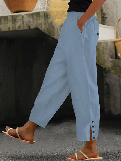 Loose fit buttoned minimalist trousers for women | Solene