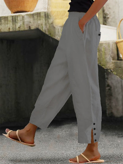 Loose fit buttoned minimalist trousers for women | Solene