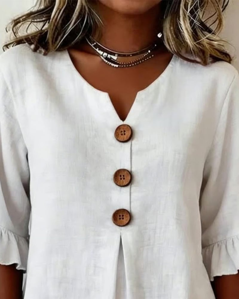 Cotton V-neck ruffle half sleeve blouse for women | Patrizia