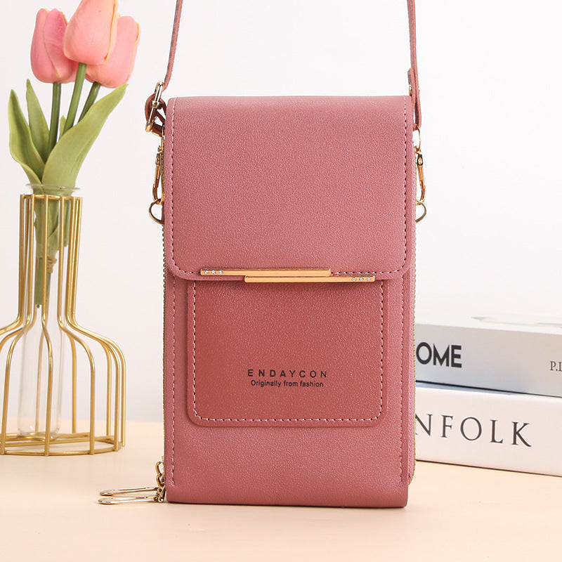 Stylish touch-screen phone messenger bag for women | Cora