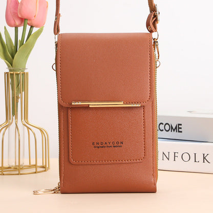 Stylish touch-screen phone messenger bag for women | Cora
