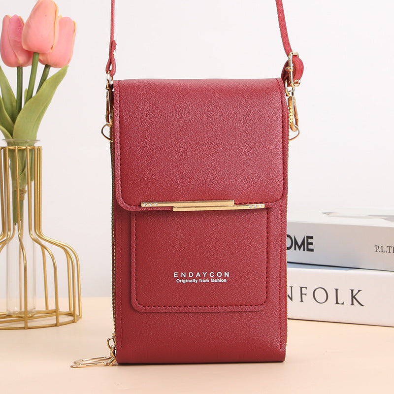 Stylish touch-screen phone messenger bag for women | Cora
