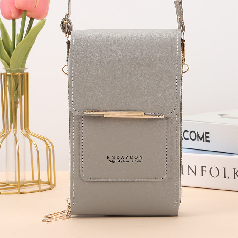 Stylish touch-screen phone messenger bag for women | Cora