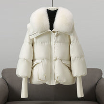 Extended-length puffer jacket with statement collar for women | Elara