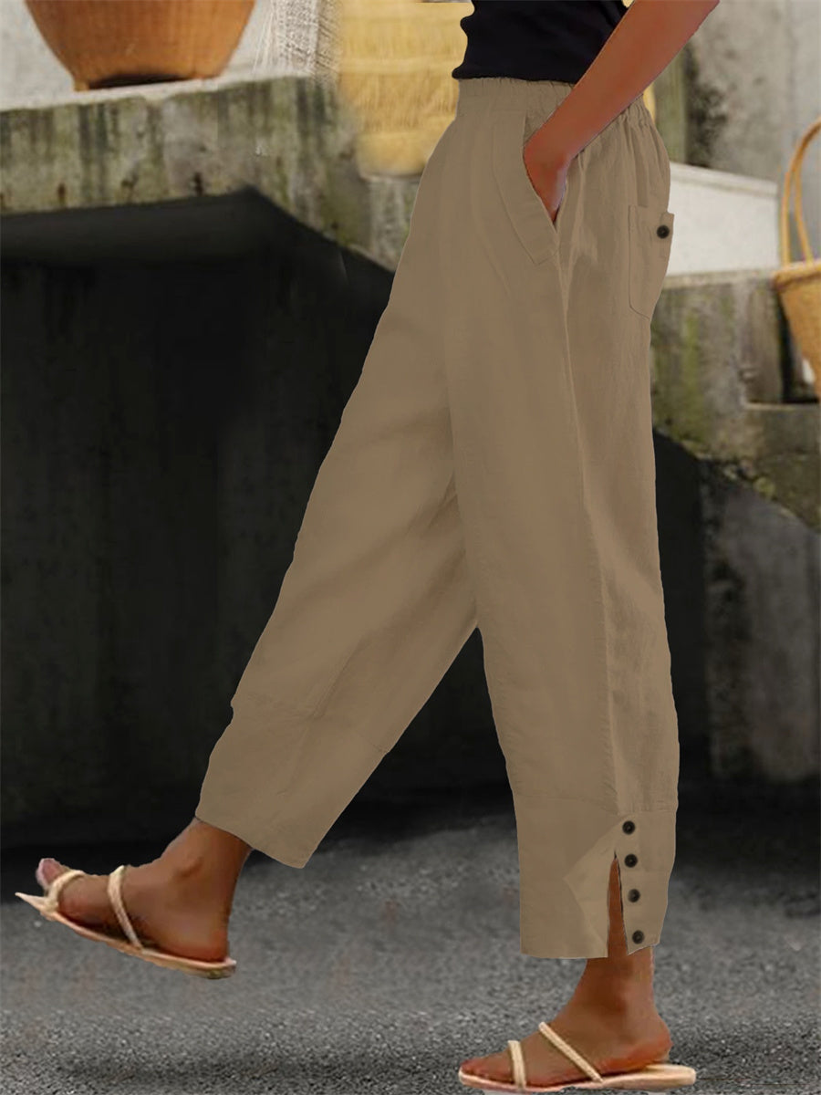 Loose fit buttoned minimalist trousers for women | Solene