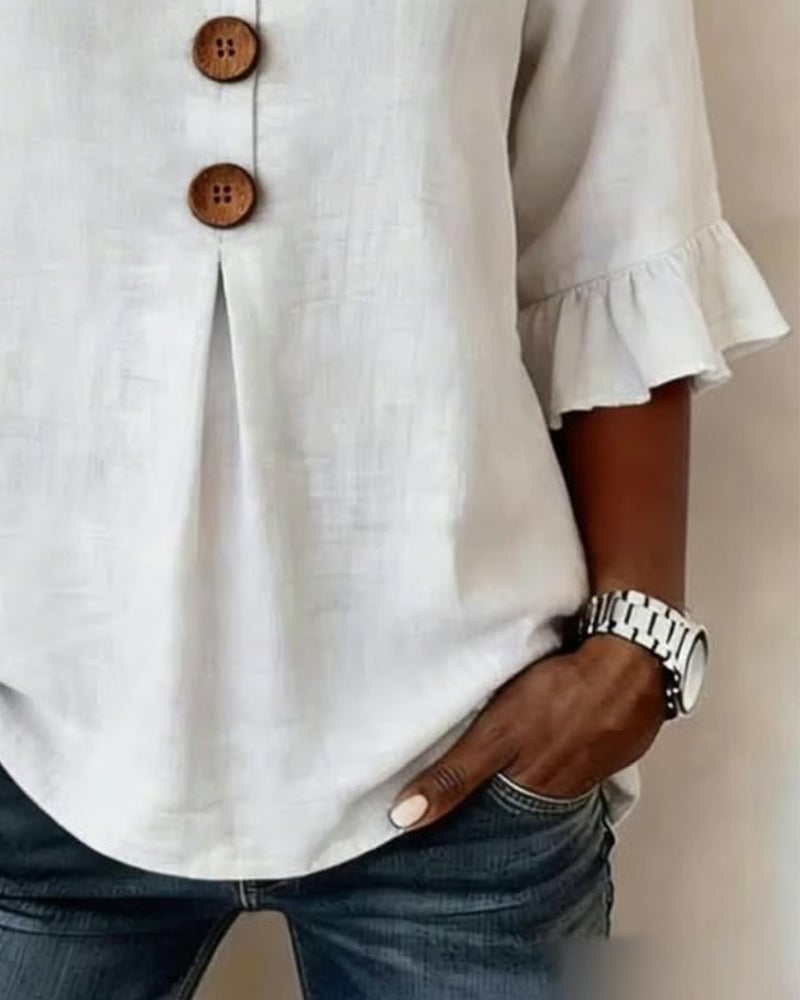 Cotton V-neck ruffle half sleeve blouse for women | Patrizia