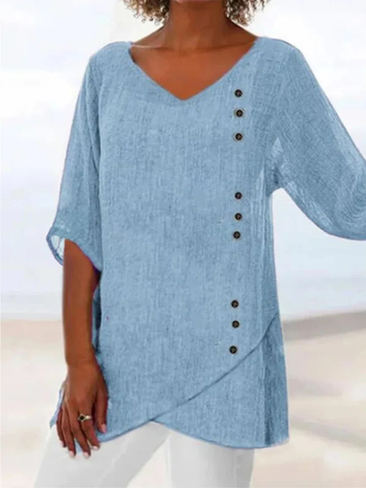 Blue button-trim asymmetrical hem blouse for women | Ondine