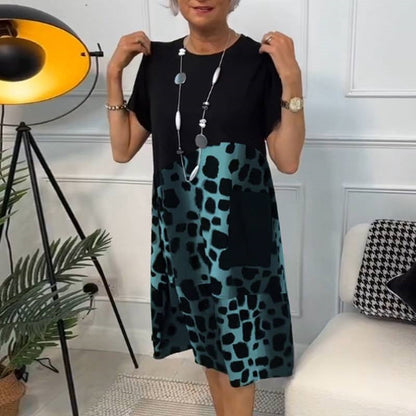 Vibrant printed loose fit round neck dress for women | Marisela